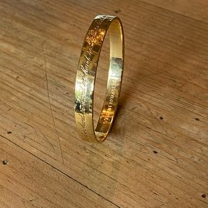 Kate Spade hand in hand gold bangle
